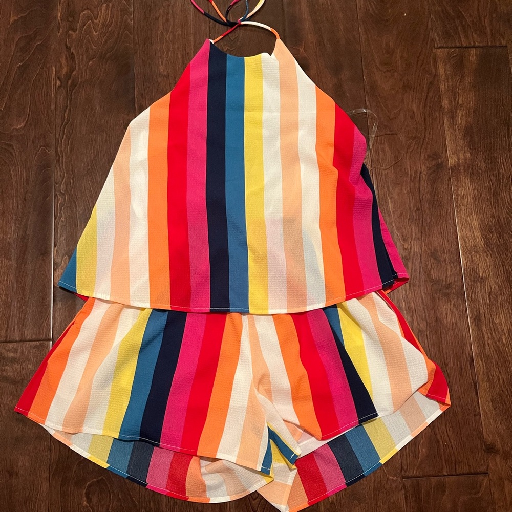 Colorful, comfortable romper! Like new! Ties around the neck.